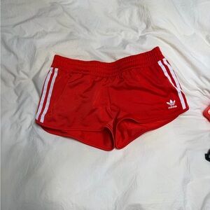 adidas Red Women's Athletic Shorts with White Three-Stripes